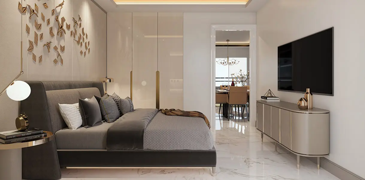 Stylish bedroom featuring a large bed, decorative wall art, and a TV unit.