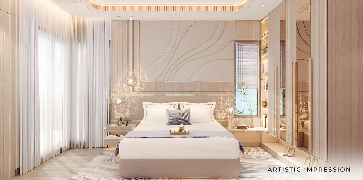 Bright bedroom featuring a large bed, decorative pillows, and elegant wall design.
