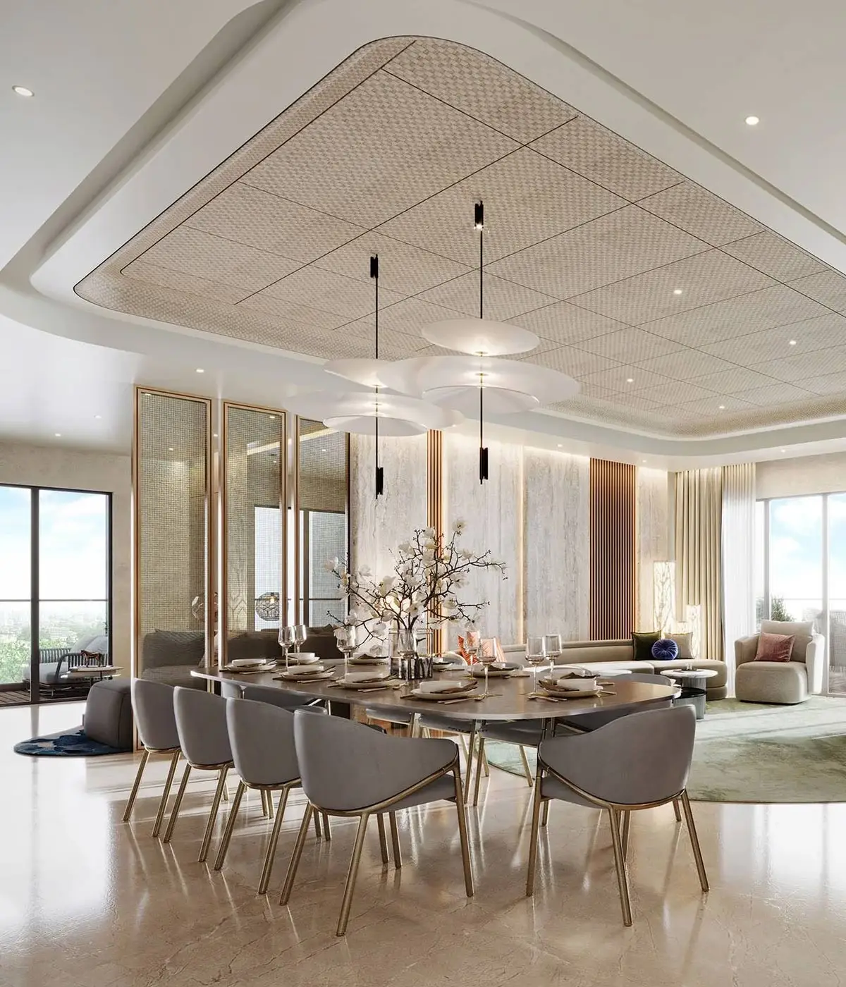 Modern dining room with a large round table, elegant chairs, and stylish lighting fixtures.