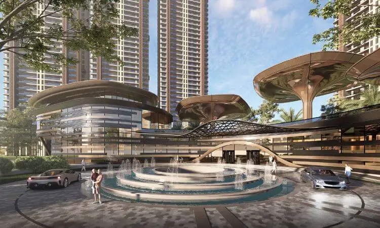 Modern residential complex with unique architectural features, water fountain, and landscaped surroundings.