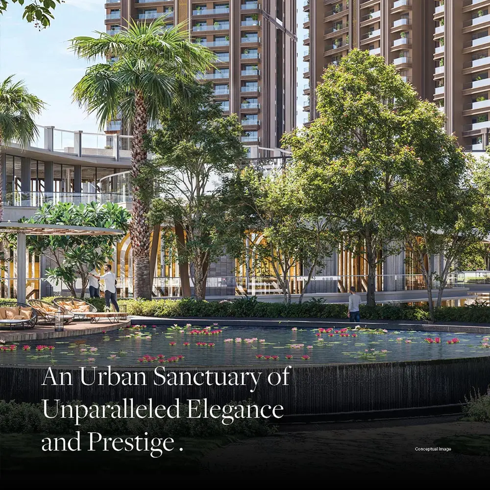 Lush greenery surrounds a water feature with flowers, tall buildings in the background.