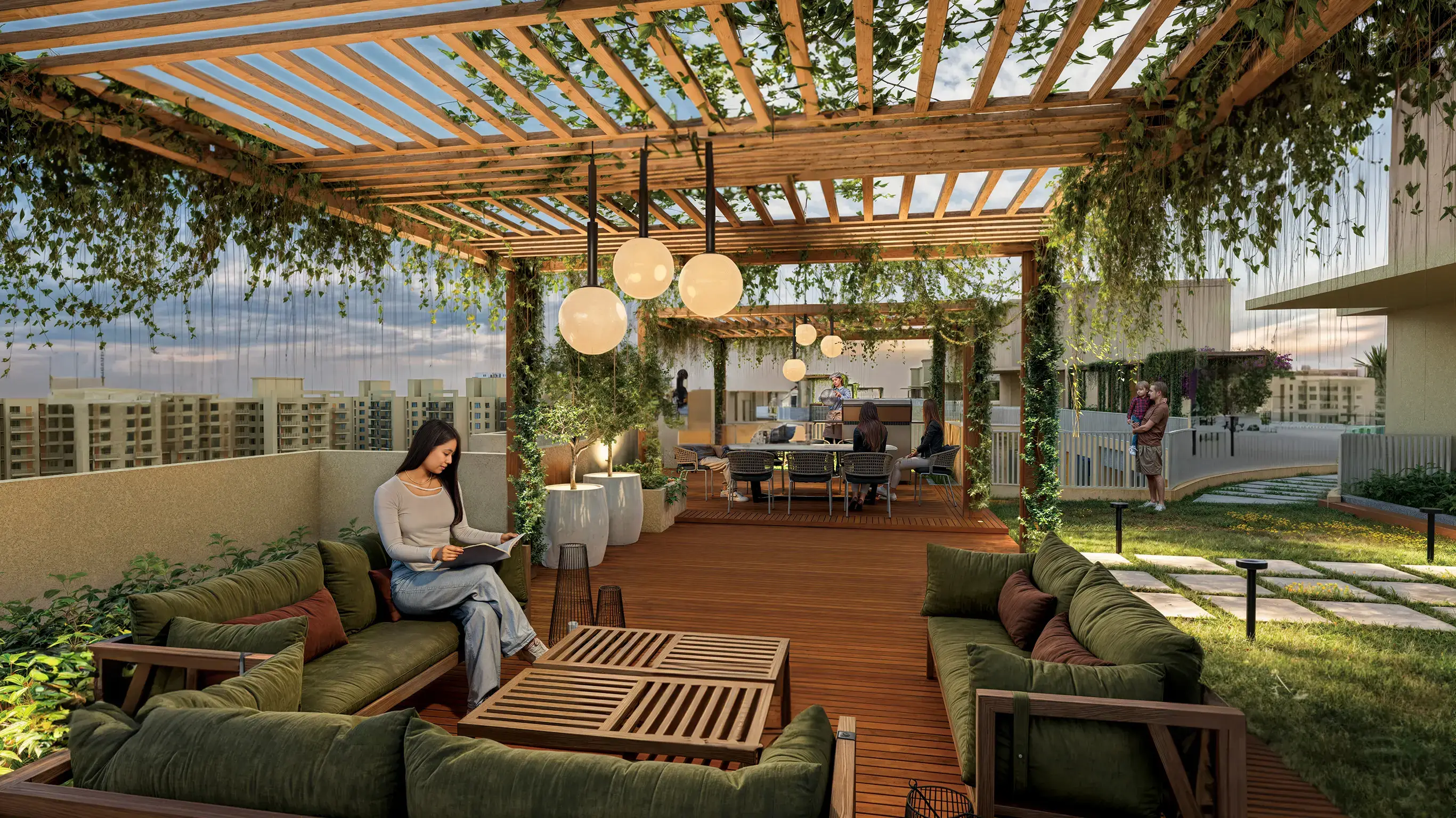 A rooftop lounge with wooden flooring, green seating, hanging lights, and plants, featuring people socializing.