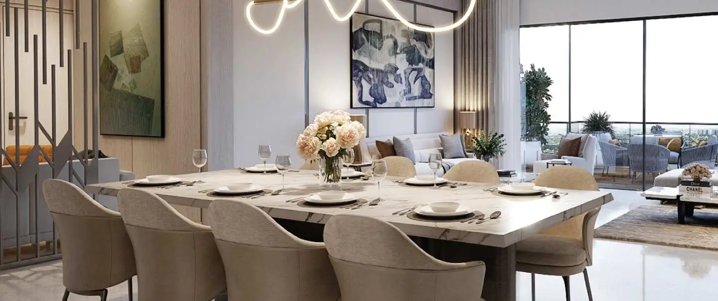 Modern dining table set with chairs, centerpiece flowers, and a unique light fixture.