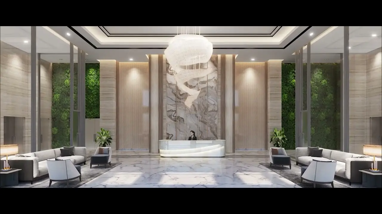 Modern lobby with marble flooring, reception desk, stylish seating, and greenery.