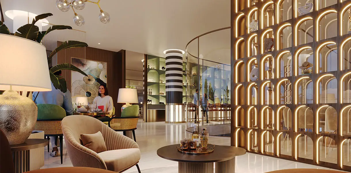 Stylish lounge with elegant furniture, decorative wall, and a bar area in background.