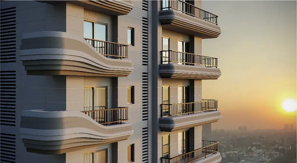 Close-up of a modern building facade with curved balconies and sunset in the background.