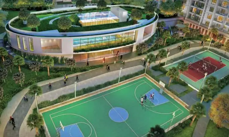 Aerial view of sports courts with basketball and tennis, surrounded by greenery and pathways.