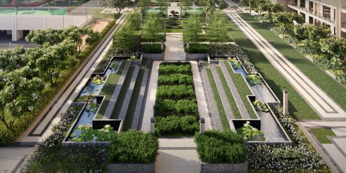 Aerial view of landscaped garden with tiered greenery, water features, and pathways.