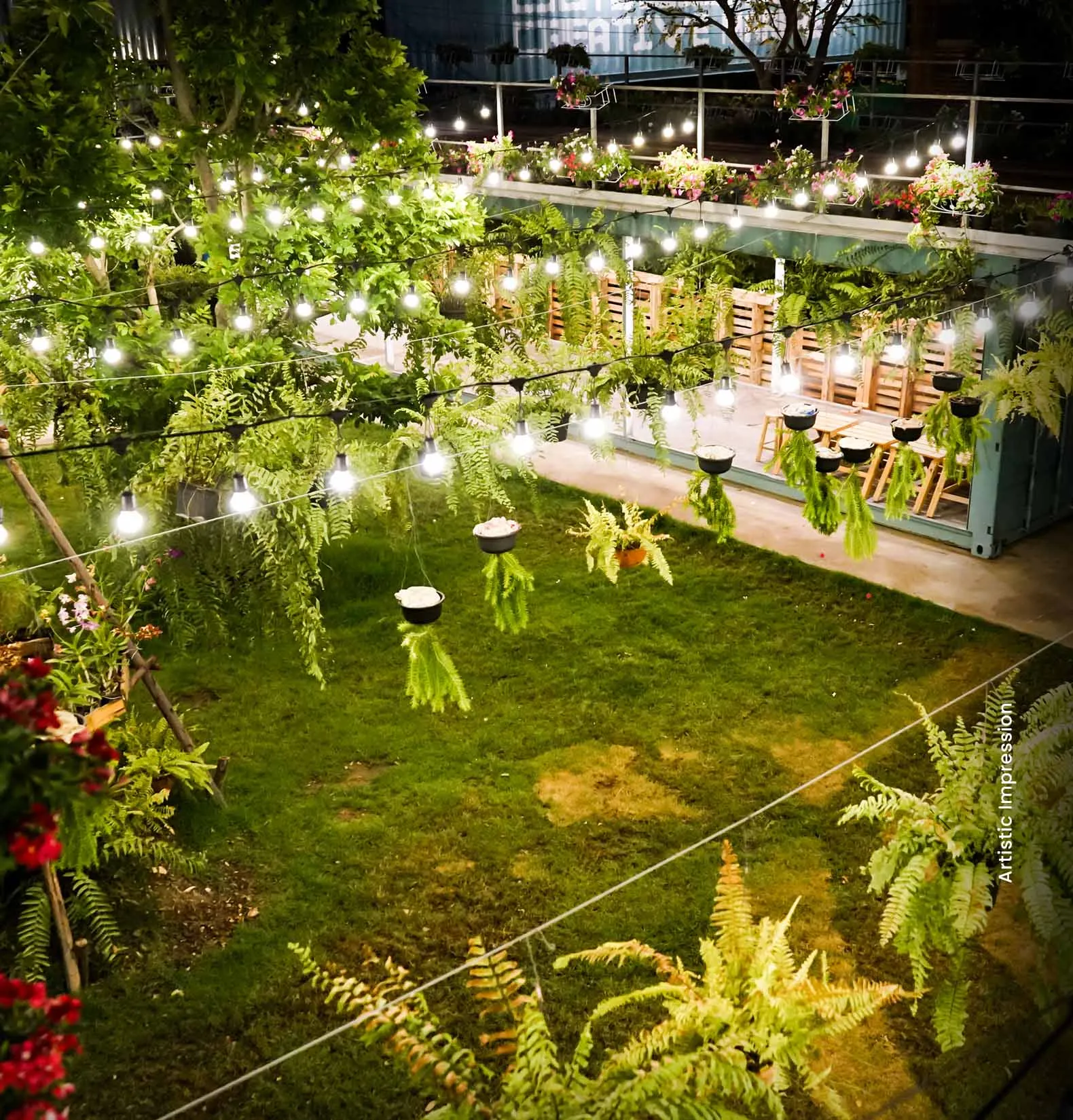 A vibrant garden with hanging ferns and string lights illuminating wooden seating areas.