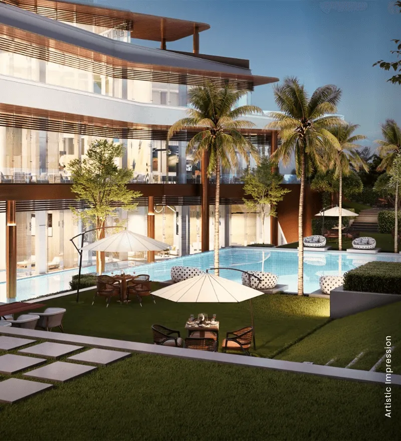 Modern building with large windows, pool, palm trees, and outdoor seating area.