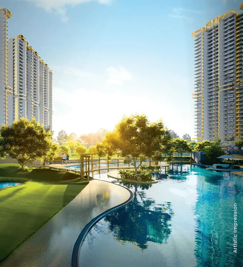 Modern residential buildings beside a serene pool and landscaped gardens under a bright sky.