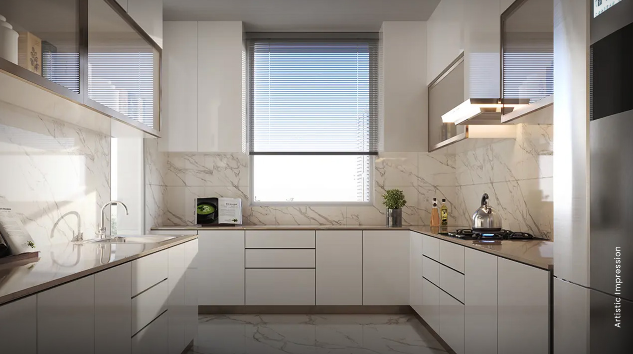 Bright kitchen with white cabinets, marble countertops, window, and stainless steel appliances.