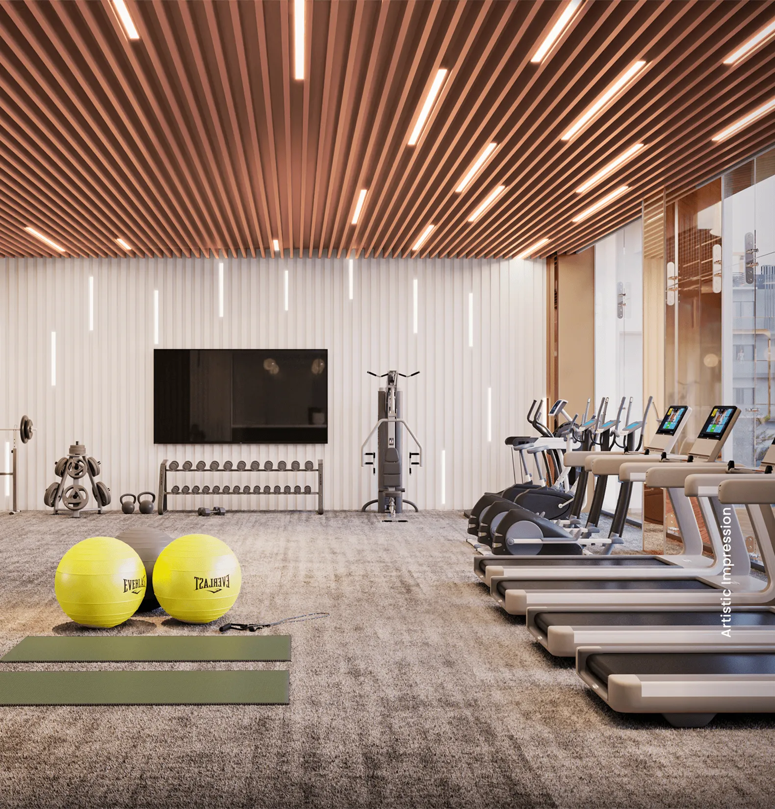 Spacious gym with exercise equipment, weights, and bright ceiling lights.