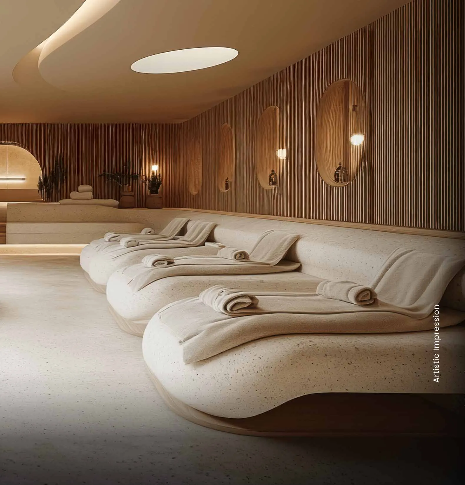 Luxurious spa room featuring curved loungers, soft towels, and warm ambient lighting.