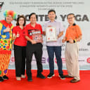 Minister Chee Hong Tat with SWA representatives and Singapore Book of Records official celebrating the Largest Mass Laughter Yoga Session