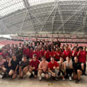 Large group of participants and SWA Laughter Yoga volunteers at The Kallang National Stadium Open House 2026