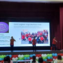 SWA Laughter Yoga Wellness Club presentation on stage at Bishan Community Club for International Women's Day 2026