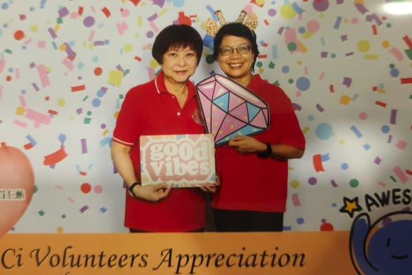 Sara Mei Woo and Angela Wong receiving 5 Years Long Service Certificate at Ren Ci Volunteer Appreciation Event 2025