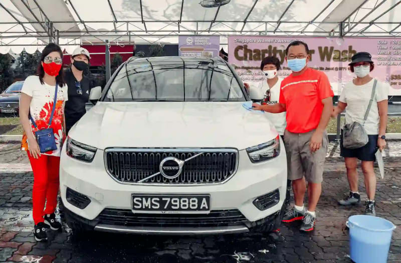 SWA volunteers washing cars at St Gabriel's Secondary School for the Charity Car Wash fundraiser