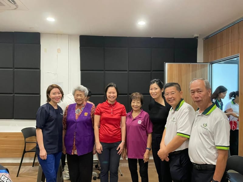 Volunteers assisting participants