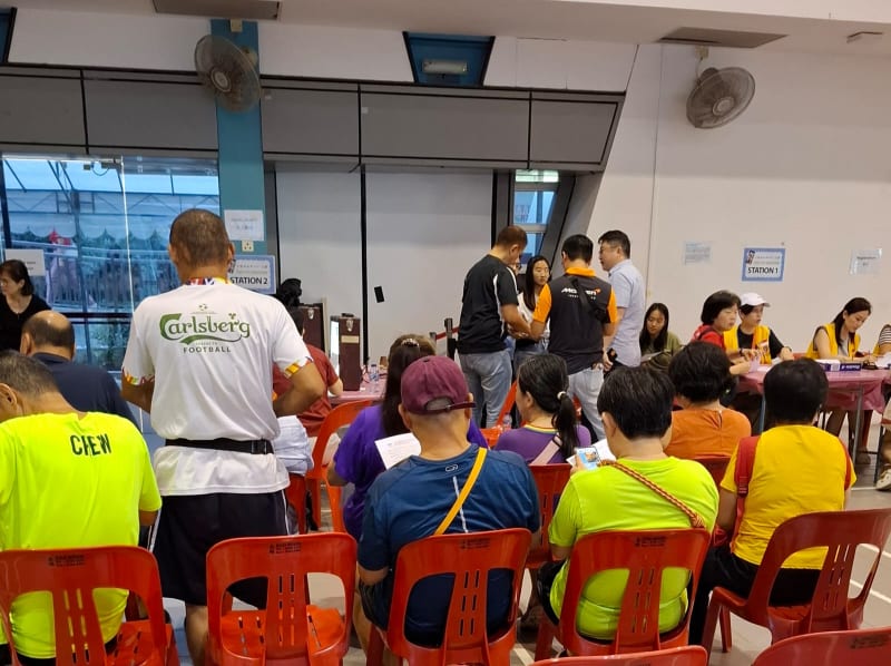 Residents registering for the eye screening