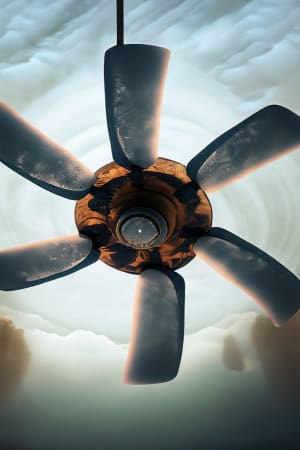 ventilateur avec palmes, dans un ciel nuageux