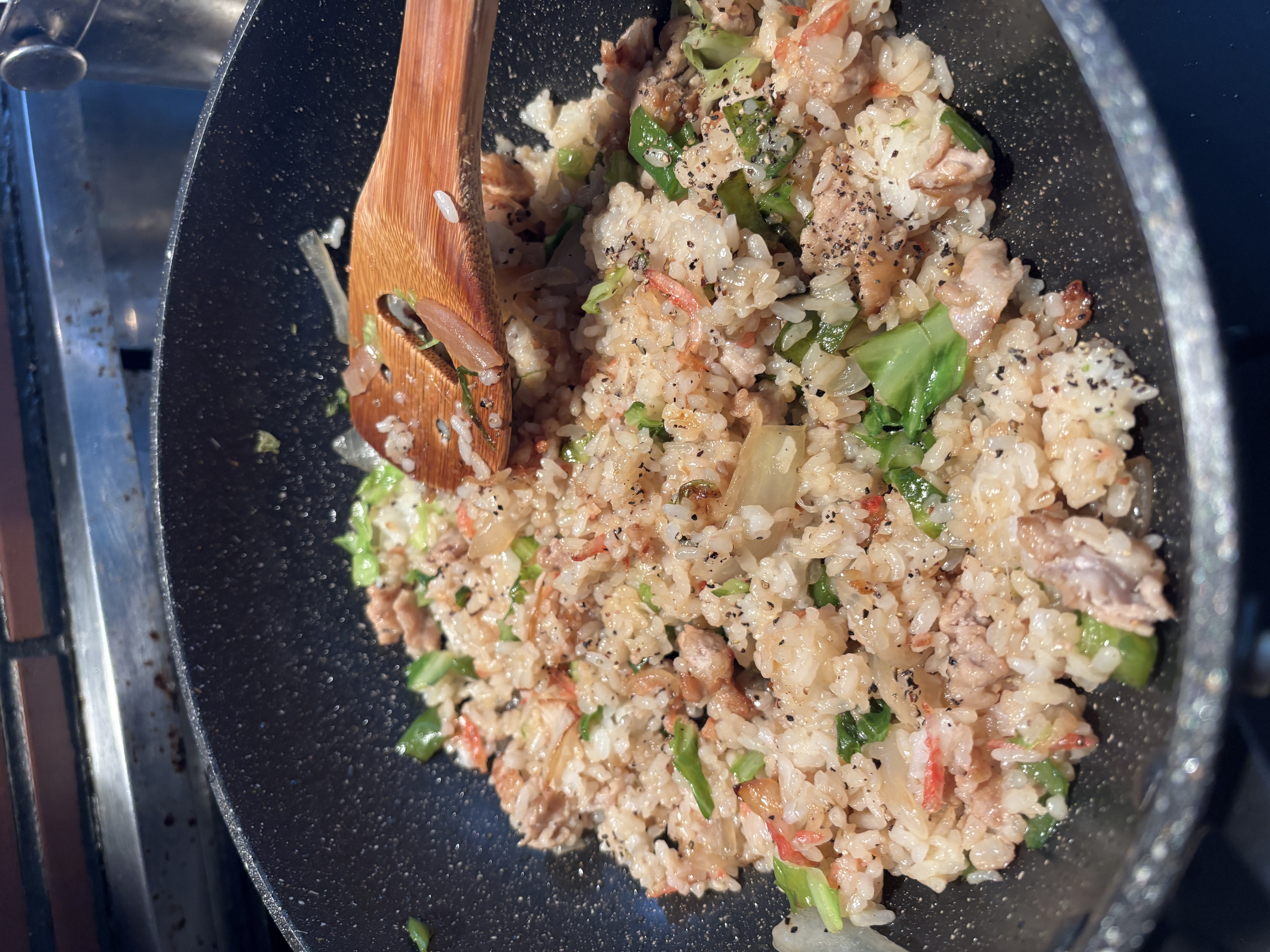 Homemade fried rice served in a bowl, made by grandma.