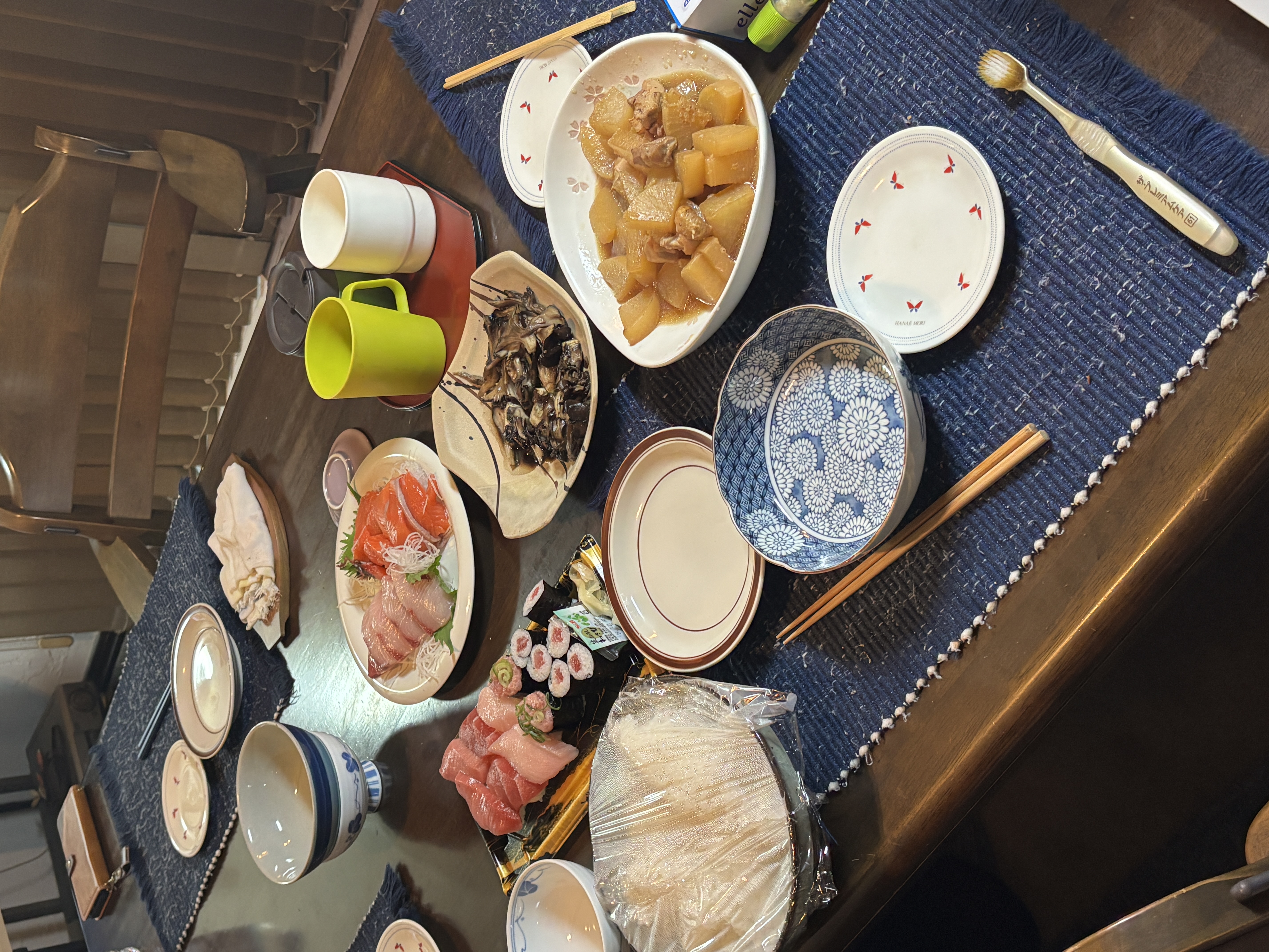 A dinner spread enjoyed at home, a simple but meaningful meal before departure.