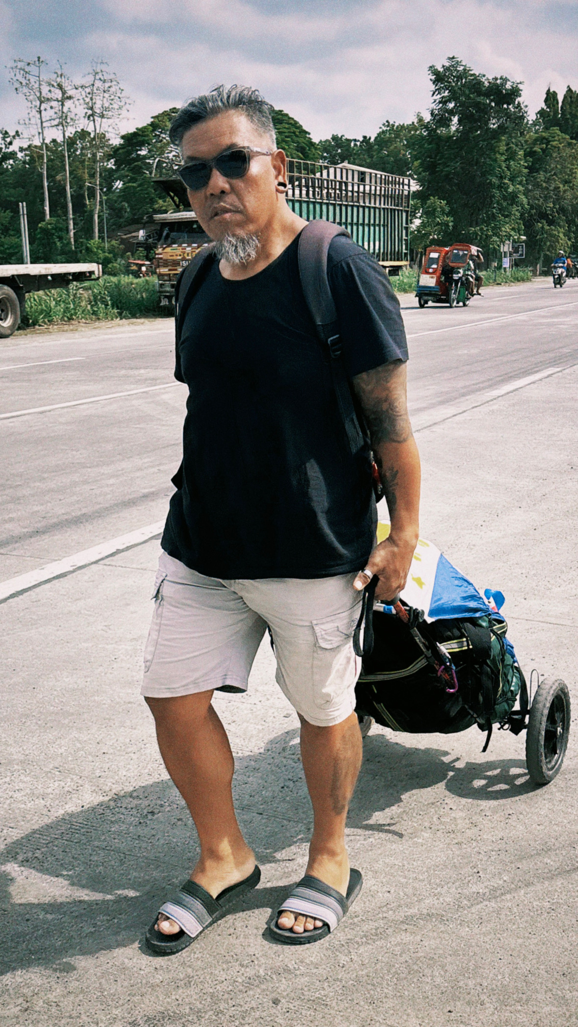 Trying out pulling the bike trailer, testing how it feels to walk with it