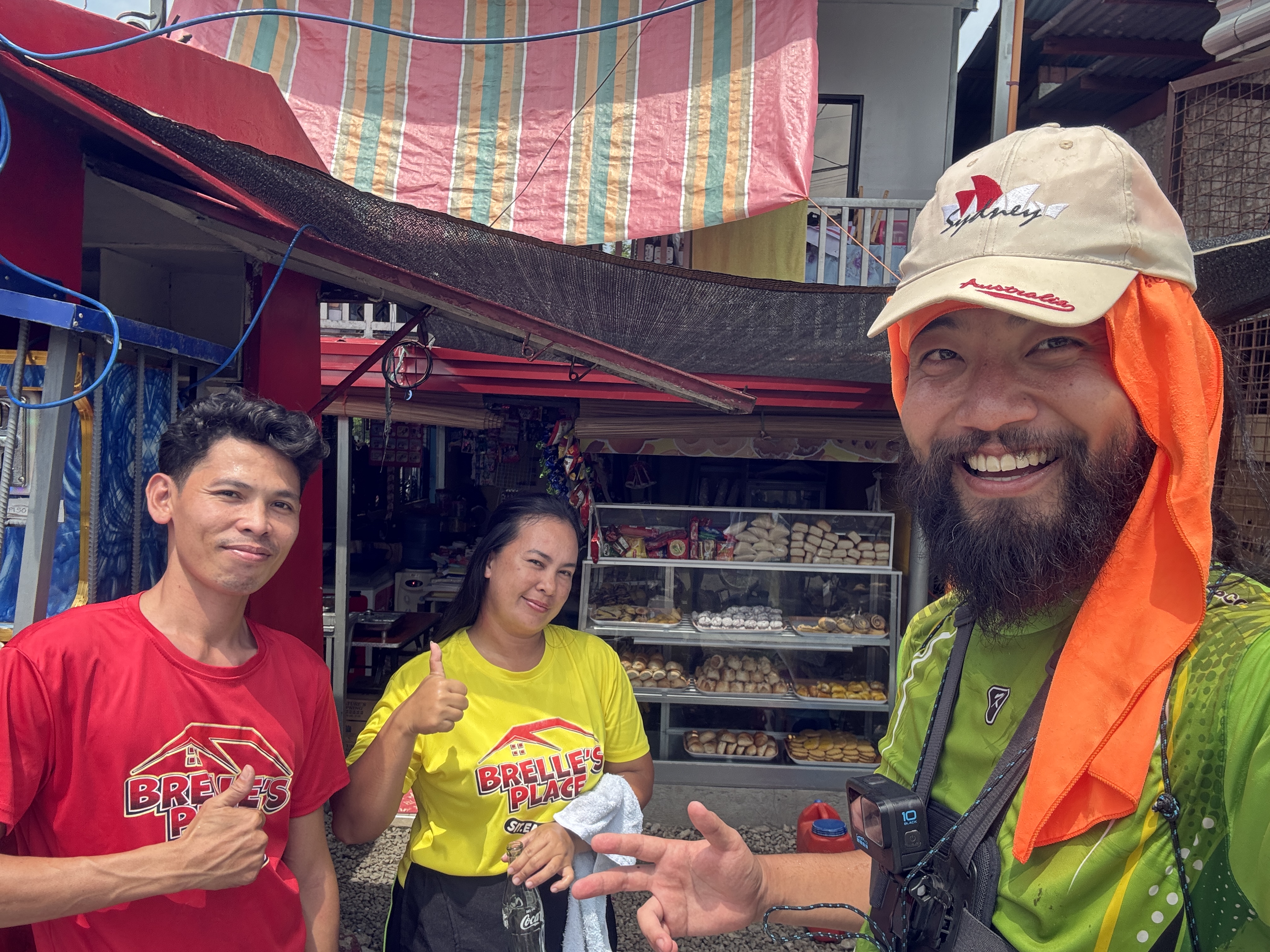 Photo with the friendly staff at the first carinderia along the route