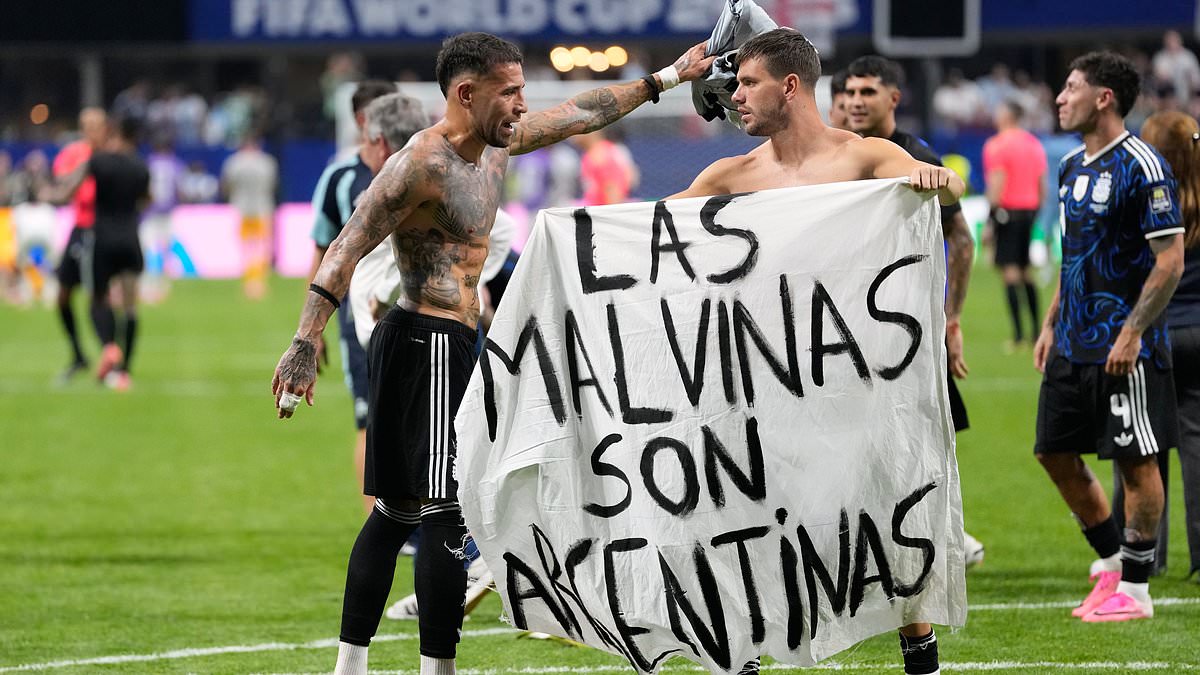 Argentina players hold banner claiming Falkland Islands after World Cup semi-final clash with England