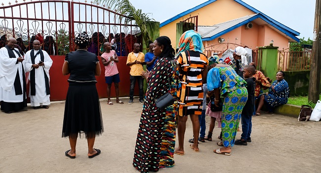 Church Congregation Forced To Worship Outdoors Due To Flood Crisis