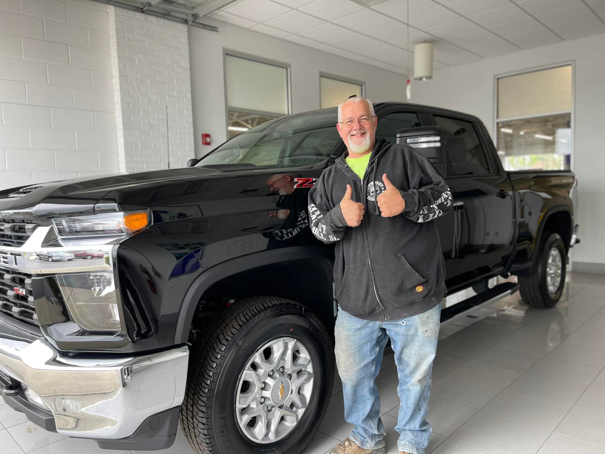 Lee with their new vehicle