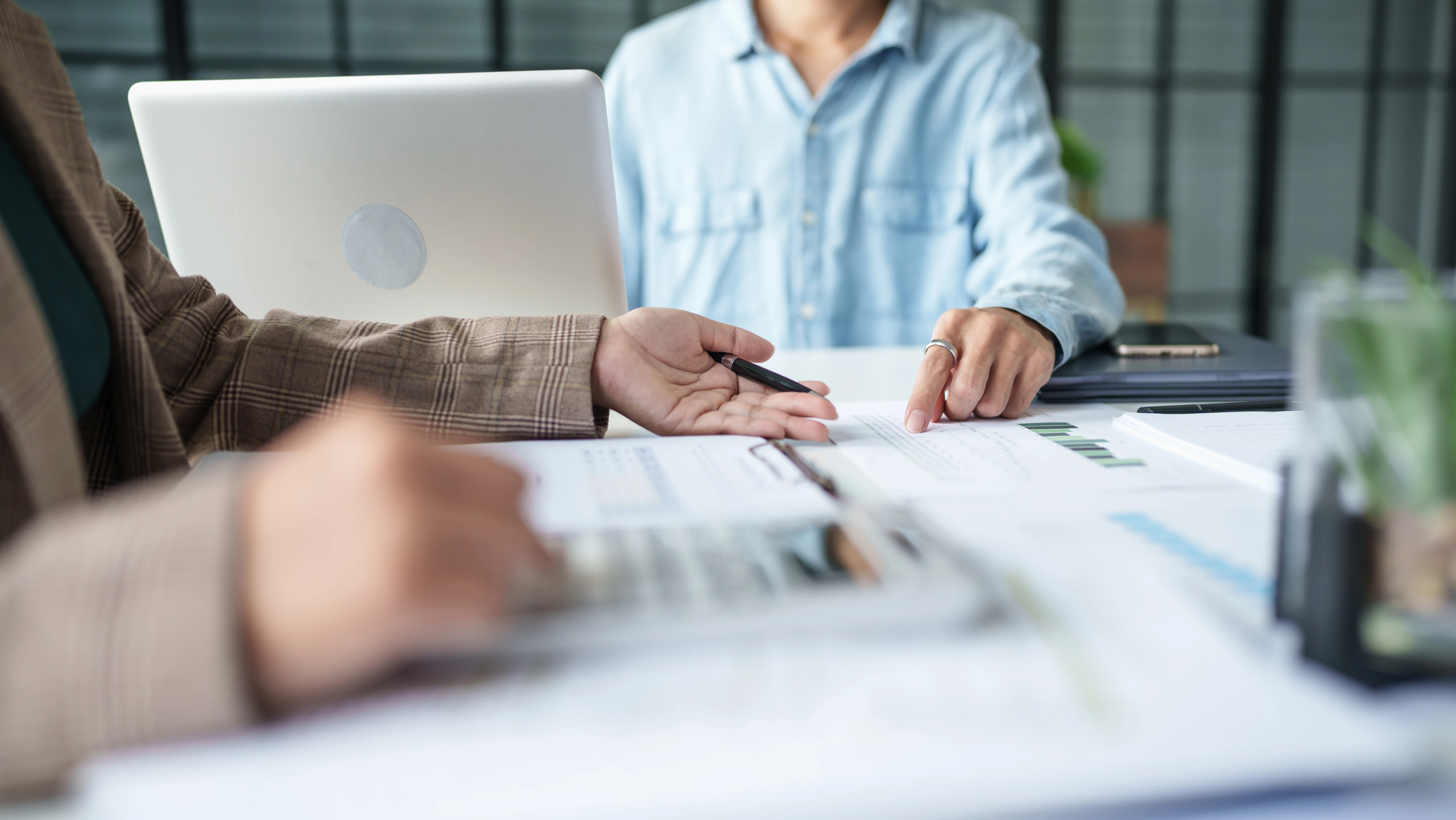 Accountant preparing monthly financial statements for management review