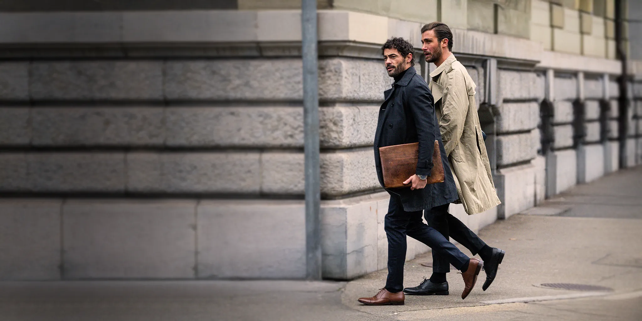 People walking in handcrafted leather shoes