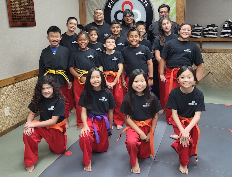 group of kids and adults at Solis Martial Arts