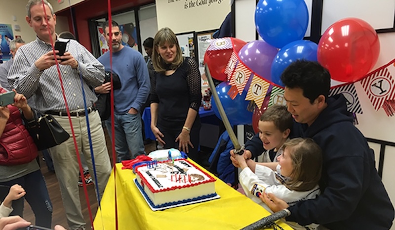 Birthday cake cutting with sword