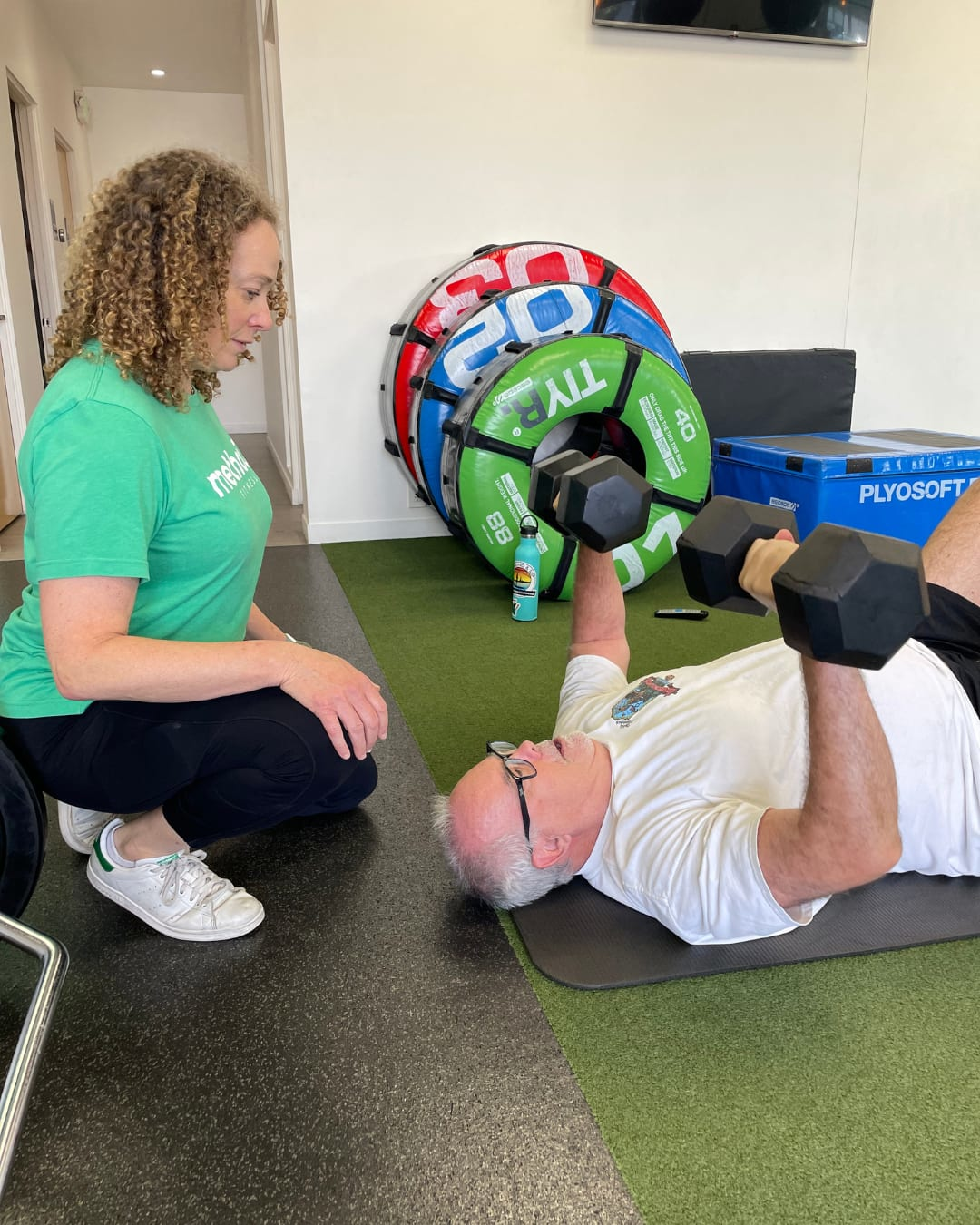 Method3 Fitness coach providing in-person guidance during a strength training session