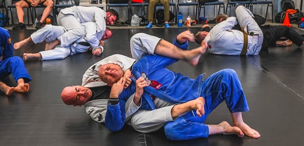 group of men practicing BJJ