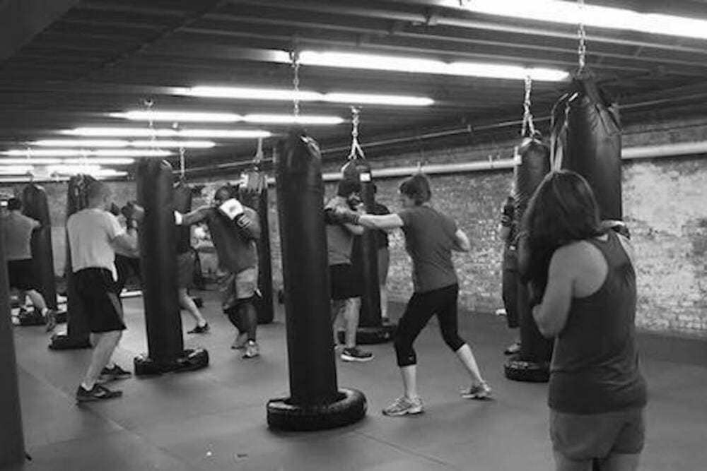 group of people in a HIIT kickboxing class