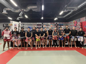 Celebrating Milestones: New Muay Thai Coaches Emerge at American Top Team - Tracy