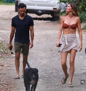 Gisele Bundchen supported by jiu-jitsu pro partner Joaquim Valente at first public event together as star gives boyfriend a sweet shout-out onstage... after supermodel denied she had cheated on Tom Brady