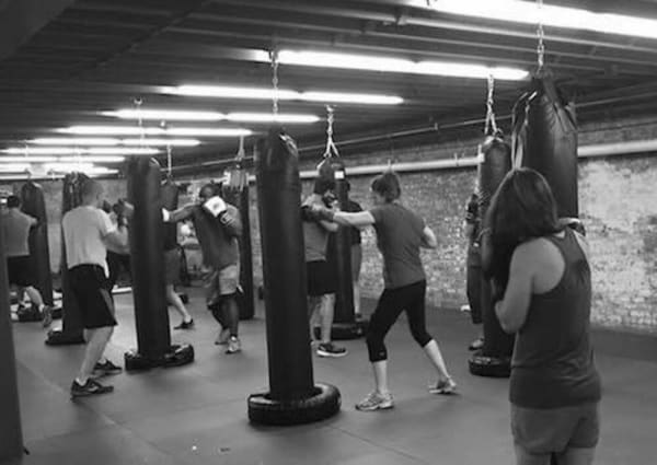 group of people in a HIIT kickboxing class