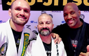 Master Carlos Machado Promotes Professor Greg Hamilton to 1st Degree & Professor