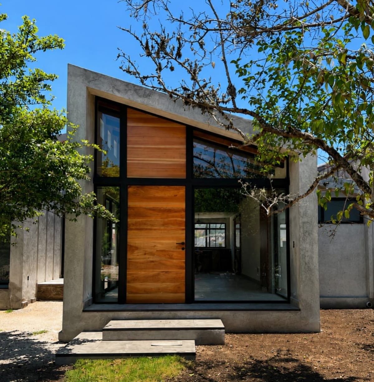 A timber cabin among pine trees