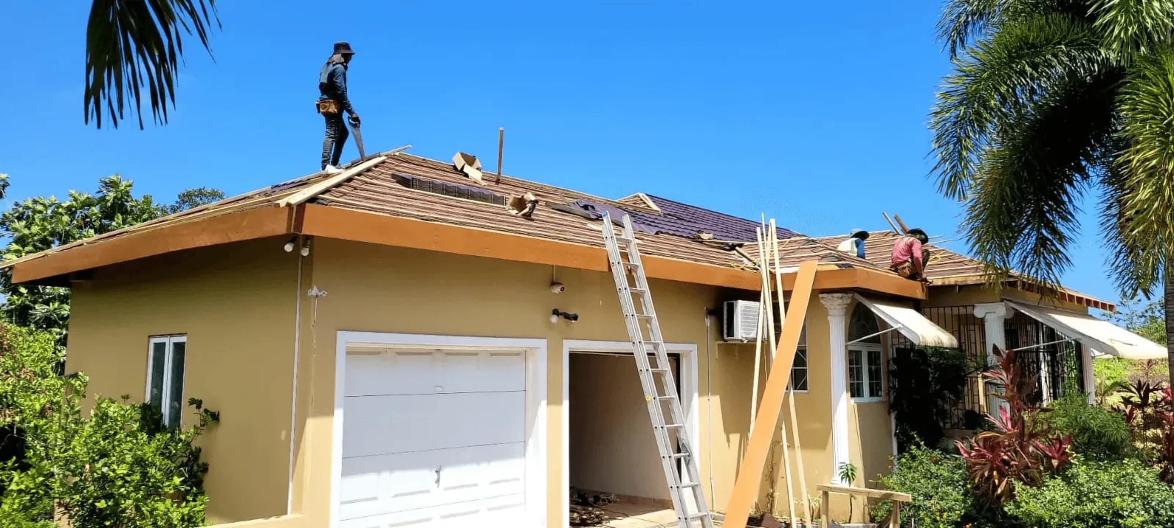 Aerial view of a major infrastructure construction site with cranes and steel framework, showcasing Eleven Star Construction's expertise in large-scale projects