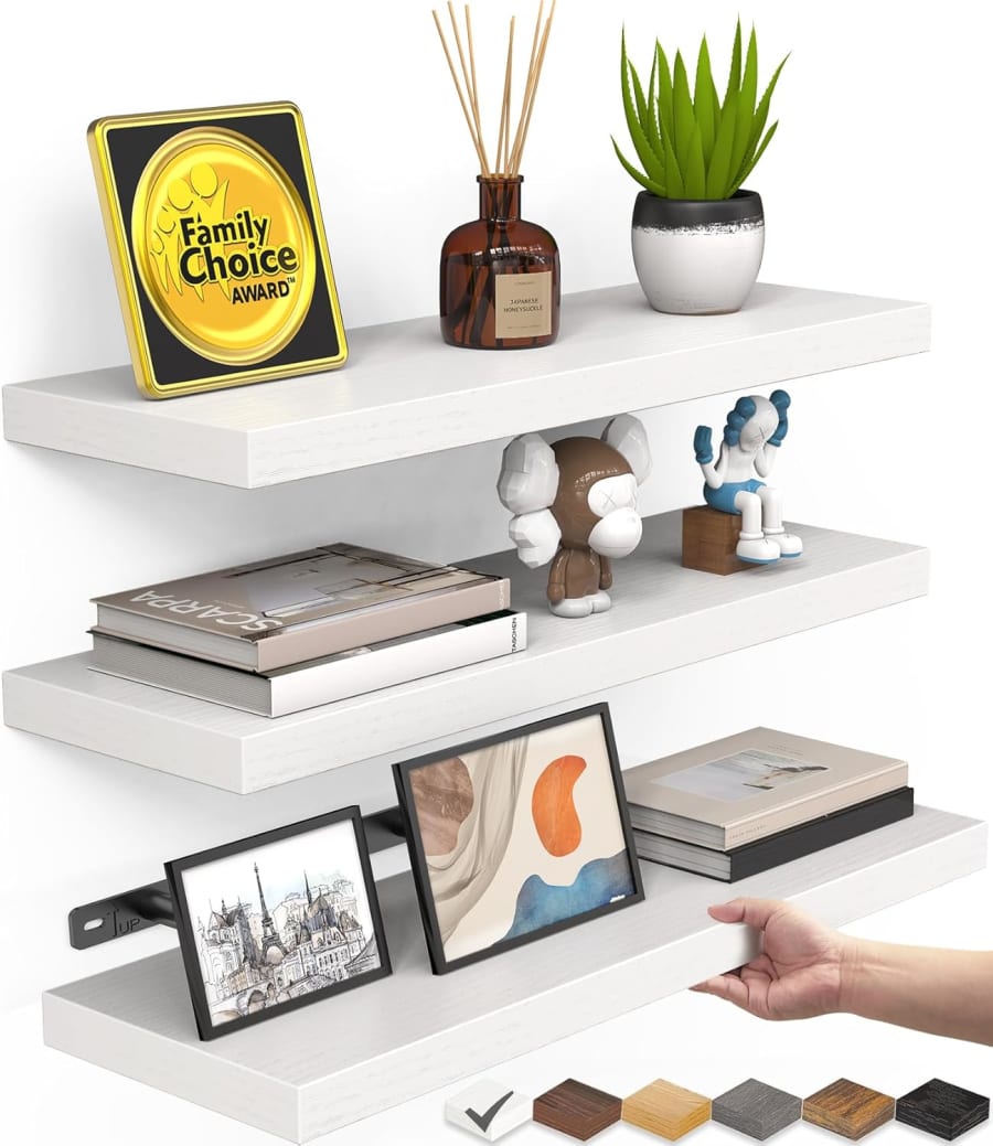 White floating wall shelves with metal brackets for books, decor, plants, and home storage