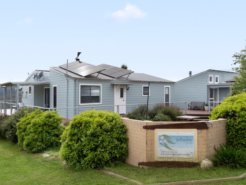 Yellowbox Cabins. Two cabins surrounded by decks