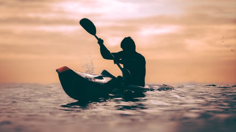 Surf ski paddler silhouette sunset Durban ocean sport photography — Kevin Rom PROFarazzi Media