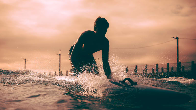 Surf lifesaving mali board competitor sunset Durban KwaZulu-Natal — Kevin Rom PROFarazzi Media